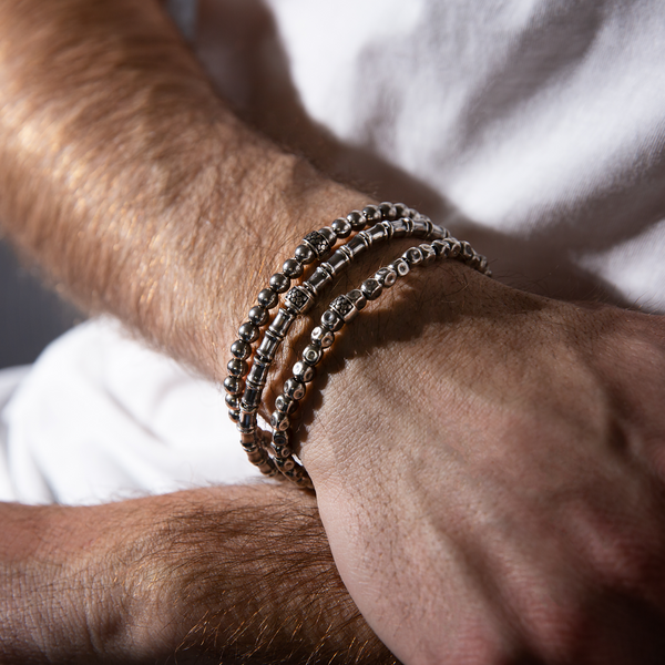 Bracciale Elastico con Sfere Sfaccettate e Rondella Texture Sirena in Argento 925